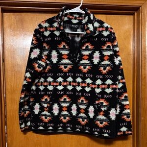 Stylish Women’s Zip-Up Sweater with Bold Patterns